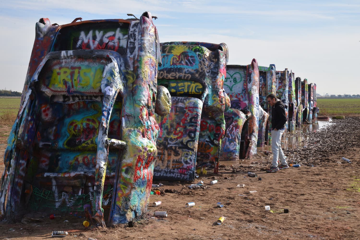 The graffiti-covered Cadillacs buried nose-first in the ground at Cadillac Ranch near Amarillo